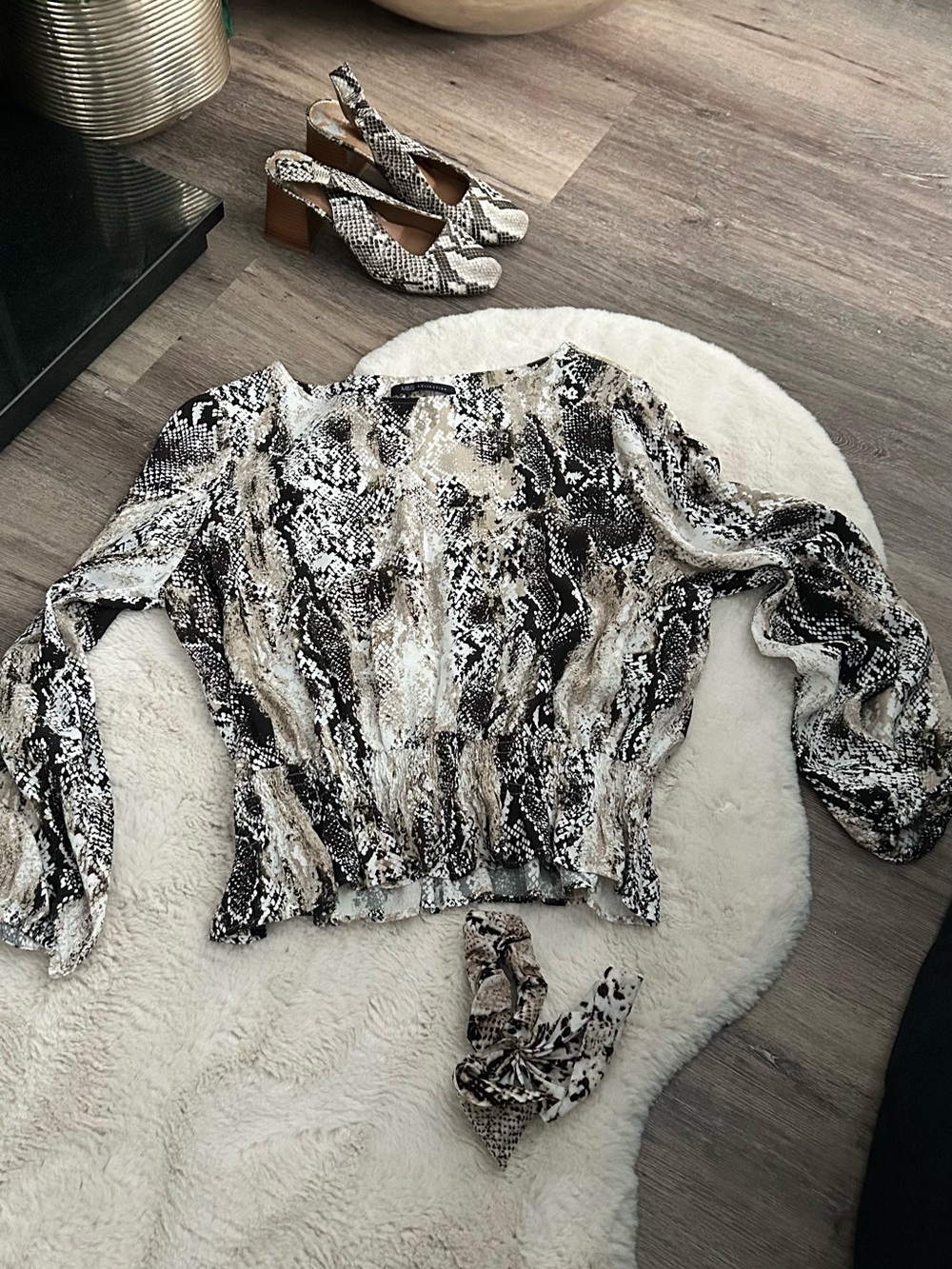 Snake print peplum style blouse